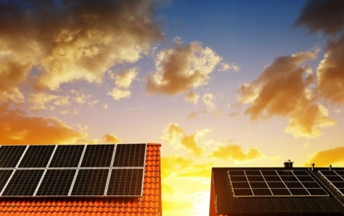 stock-photo-solar-energy-panel-on-the-roof-of-the-house-in-the-background-sunset-sky-the-concept-of-ecological-1051772642.jpg - Solar energy panel on the roof of the house in the background sunset sky. The concept of ecological housing. stock-photo-solar-energy-panel-on-the-roof-of-the-house-in-the-background-sunset-sky-the-concept-of-ecological-1051772642.jpg