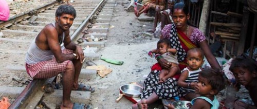 Family by railway track.