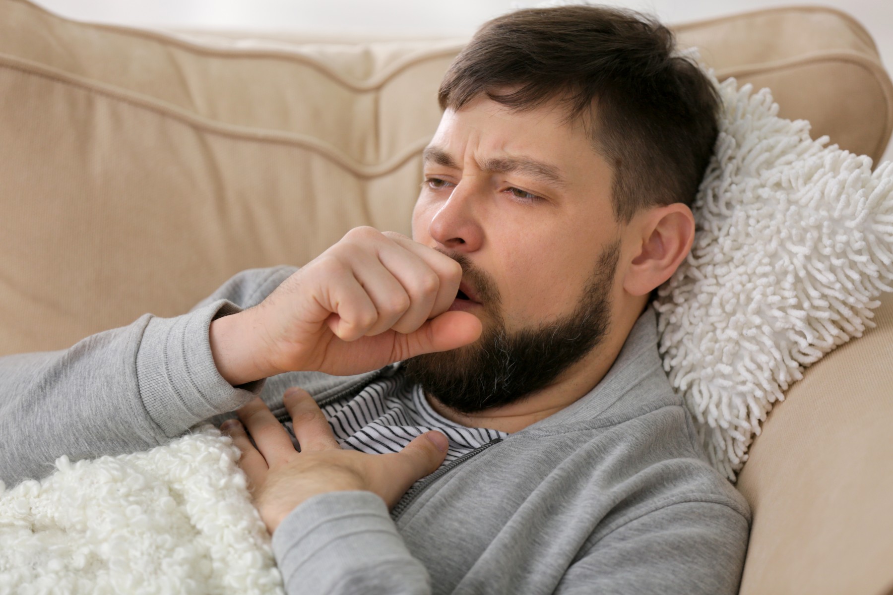 man coughing man coughing