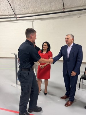 CCFD Cadet Kayden J Argiros_Corpus Christi Mayor Paulette Guajardo_DMC President and CEO Mark Escamilla - Corpus Christi Fire Department cadet Kayden J. Argiros (left) shakes hands with Del Mar College President and Chief Executive Officer Dr. Mark Escamilla as Corpus Christi Mayor Paulette Guajardo congratulates him for completing the College’s innovative Emergency Medical Technician-Paramedic certification pilot program. Argiros is one of 22 CCFD cadets to mark a milestone by earning their EMT-Paramedic certification simultaneously. A first of its kind in Texas and the nation, the program saved the City of Corpus Christi about four months of training time and $17,000 to train the cadets for these required certifications before they become firefighters. (Credit: DMC Digital Services) CCFD Cadet Kayden J Argiros_Corpus Christi Mayor Paulette Guajardo_DMC President and CEO Mark Escamilla