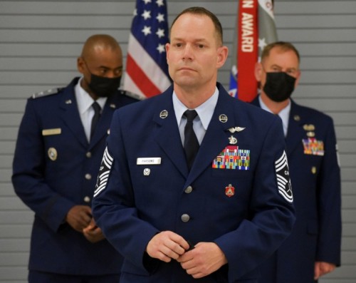 Commandant comments - Chief Master Sgt. Todd H. Parsons speaks at the 2021 Mid-Atlantic Honor Guard Academy graduation ceremony before commencement. He was academy commandant. Commandant comments
