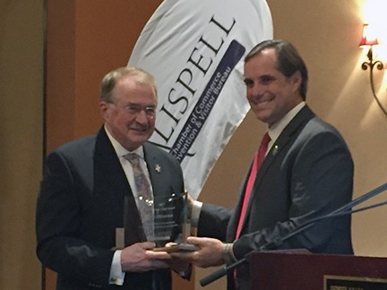 jim-oliverson-award - Jim Oliverson, retired vice president of community relations at Kalispell Regional Healthcare, is congratulated by Tagen Vine, president of Kalispell Regional Healthcare Foundation. Oliverson was awarded with the 2017 Great Chief Award. jim-oliverson-award