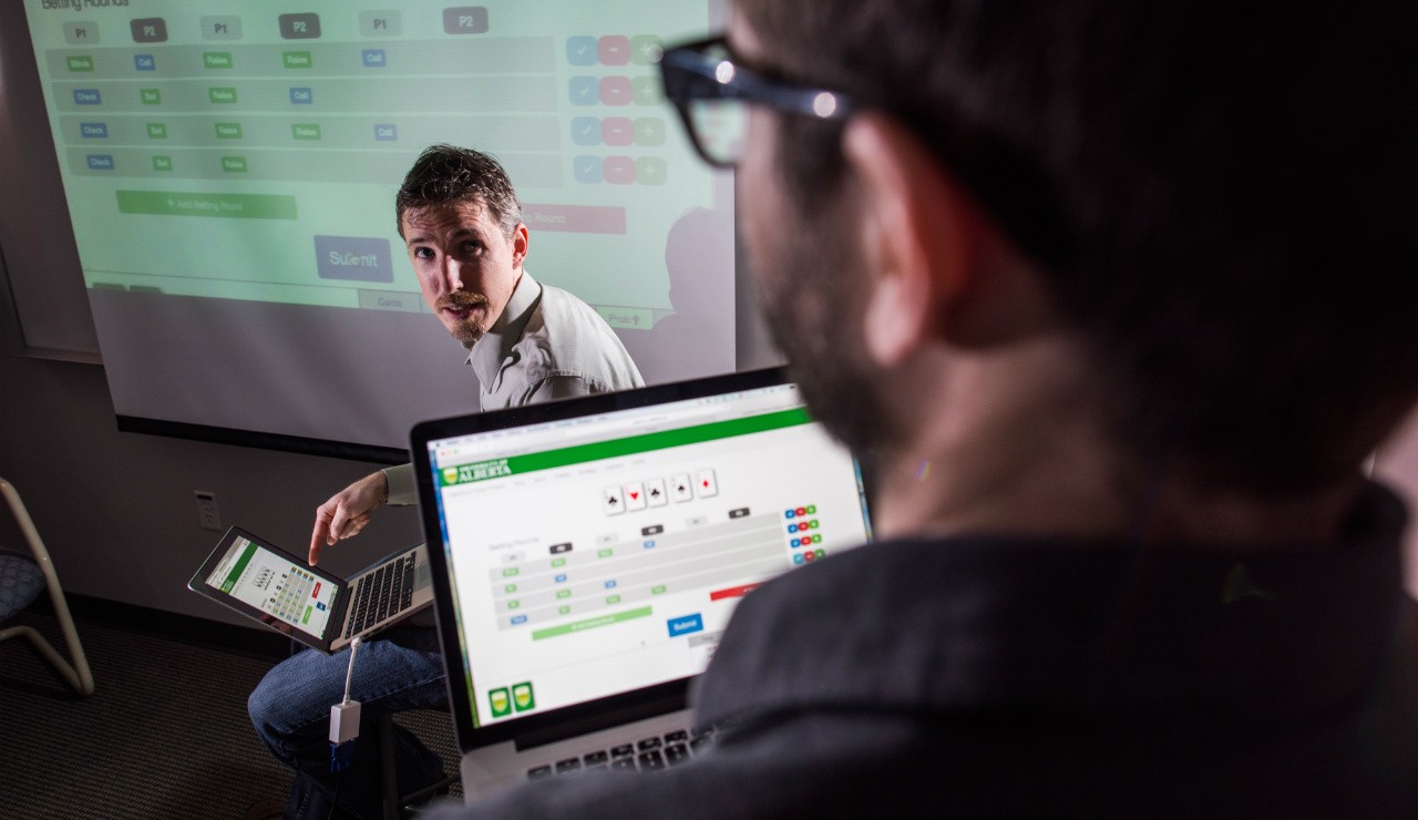 Michael Bowling (left) led a team that essentially solved heads-up limit Texas hold 'em in 2015. Last year, he led another project that saw an AI-based program called DeepStack beat professional poker players at no-limit Texas hold 'em—a significantly more complex version of the popular poker game. (Photo: John Ulan) Michael Bowling (left) led a team that essentially solved heads-up limit Texas hold 'em in 2015. Last year, he led another project that saw an AI-based program called DeepStack beat professional poker players at no-limit Texas hold 'em—a significantly more complex version of the popular poker game. (Photo: John Ulan)
