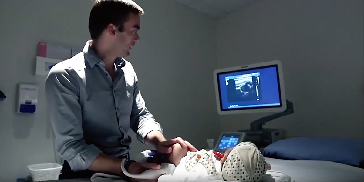 U of A radiologist and Medo.ai co-founder Jacob Jaremko performs an ultrasound scan on a baby to diagnose hip dysplasia. The U of A spinoff company is developing an app that would allow expert analysis of medical ultrasound images with minimal training—a boon for rural and remote areas with limited access to radiology services. (Image: Medo.ai) U of A radiologist and Medo.ai co-founder Jacob Jaremko performs an ultrasound scan on a baby to diagnose hip dysplasia. The U of A spinoff company is developing an app that would allow expert analysis of medical ultrasound images with minimal training—a boon for rural and remote areas with limited access to radiology services. (Image: Medo.ai)