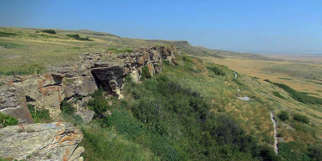 Head-Smashed-In Buffalo Jump in southern Alberta, which was used for millennia by Plains Indigenous people to hunt bison, bears evidence of controlled burning to clean up the site after a kill, according to U of A archeologist Jack Ives, who contributed to a study suggesting humans have had a detectable impact on Earth's climate for at least 5,000 years. (Photo: David Stanley, Flickr) Head-Smashed-In Buffalo Jump in southern Alberta, which was used for millennia by Plains Indigenous people to hunt bison, bears evidence of controlled burning to clean up the site after a kill, according to U of A archeologist Jack Ives, who contributed to a study suggesting humans have had a detectable impact on Earth's climate for at least 5,000 years. (Photo: David Stanley, Flickr)