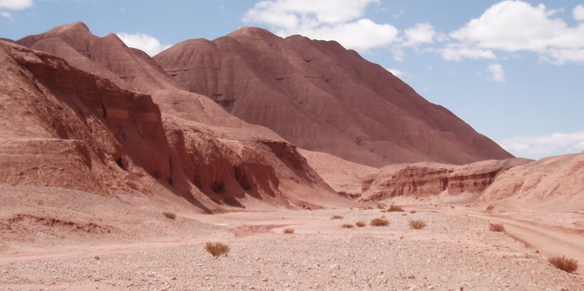 This is part of the Arizaro basin. Claire Currie‘s research indicates that subsidence occurred in this area during lithosphere removal. Subsidence started about 20 million years ago. As the surface subsided, the basin filled with sediments -- over 3 km thick! The region then started to uplift in the last 8 million years, and you now see the sediments as high elevation features. (Photo by Claire Currie, University of Alberta.) This is part of the Arizaro basin. Claire Currie‘s research indicates that subsidence occurred in this area during lithosphere removal. Subsidence started about 20 million years ago. As the surface subsided, the basin filled with sediments -- over 3 km thick! The region then started to uplift in the last 8 million years, and you now see the sediments as high elevation features. (Photo by Claire Currie, University of Alberta.)