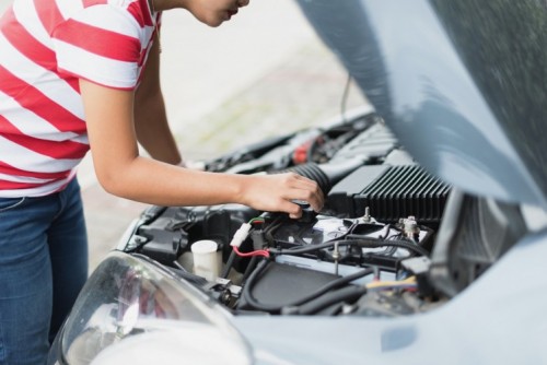 Europ Assistance car - young Asian woman is worried and checking her car broken down in selective focus.; Shutterstock ID 687464266 Europ Assistance car