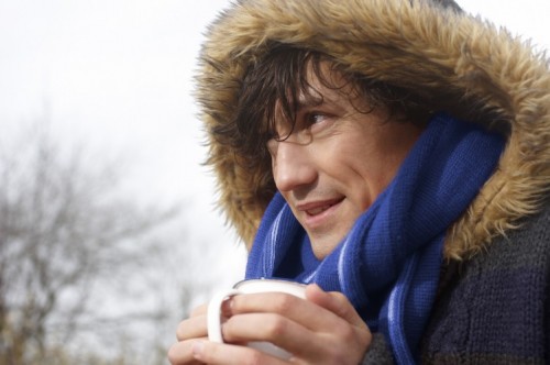 Newscred cold - A mature man standing outdoors in winter time holding a hot drink; Shutterstock ID 624080798; hello: - Newscred cold