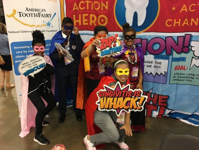 Vann educates students at the HOSA conference, encouraging all kids to be heroes in their communities when it comes to oral health.