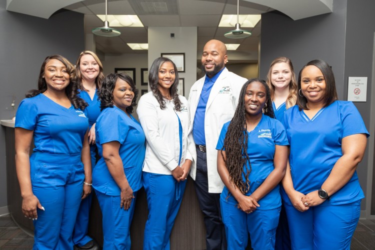 Dr. Loray and Dr. Harvey Spencer with the Healthy Smile team.