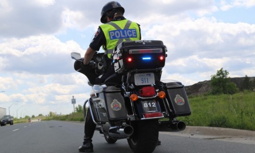 Motorcycle Unit - Motorcycle officer on road Motorcycle Unit