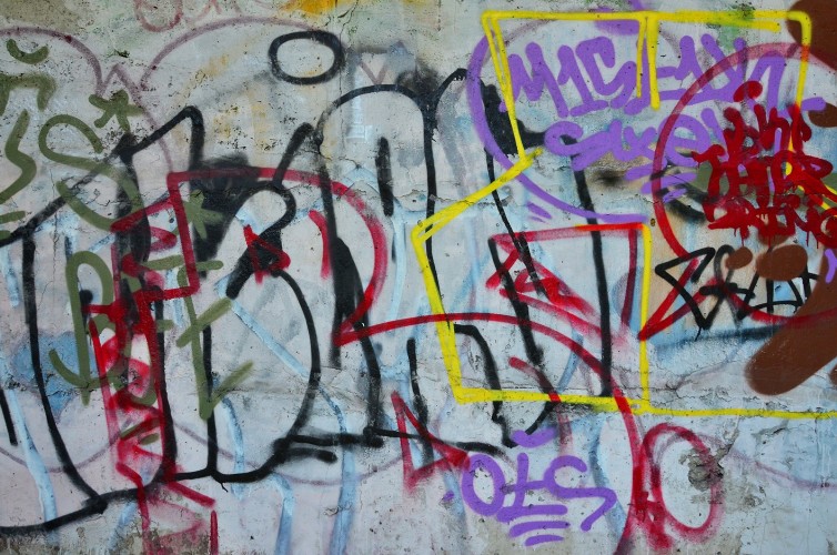 Texture Of A Fragment Of The Wall With Graffiti Painting, Which Is Depicted On It. An Image Of A Pie