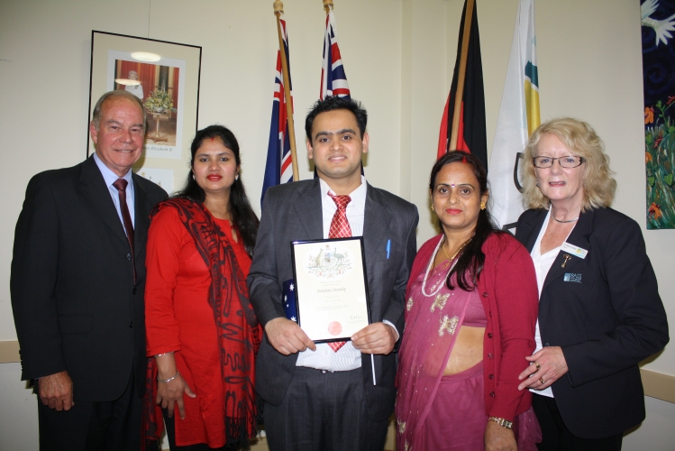 Suwash+Acharya+%28centre%29+celebrated+becoming+an+Australian+citizen+with+family+members%2C+as+well+as+Federal+Member+for+McMillan%2C+Russell+Broadbent+%28left%29+and+Bass+Coast+Shire+Mayor%2C+Clare+Le+Serve+%28right%29.