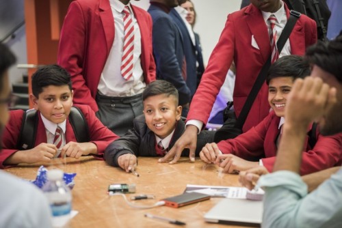 Inspired young men learn about the tech industry Inspired young men learn about the tech industry