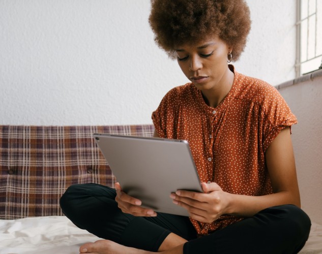 photo-of-woman-holding-tablet-3060659