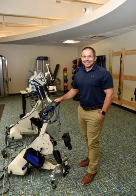 Dr. Brad Willingham commons uses technology such as the Funcitonal Electrical Stimulation (FES) Cycle pictured here to deliver adaptive rehabilitation treatment strategies.