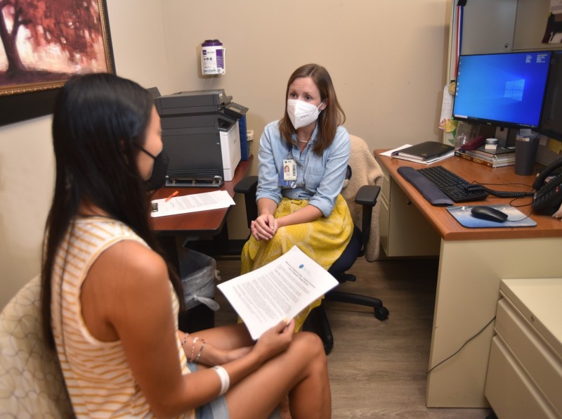 Allison Strauss reviews what to expect out of therapy and the Complex Concussion Clinic admission packet with a new patient.