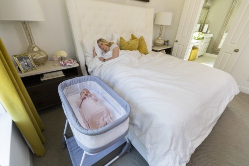 Babies may sleep in the same room as parents, but should not sleep in the same bed.