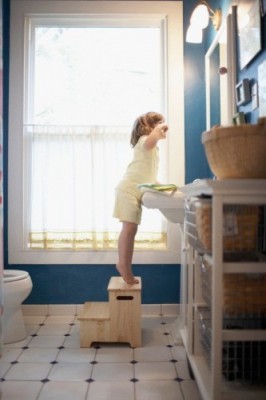 child brushing teeth - vertical