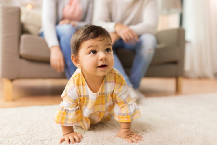 stock-photo-childhood-and-people-concept-little-baby-girl-on-floor-at-home-1019722441.jpg