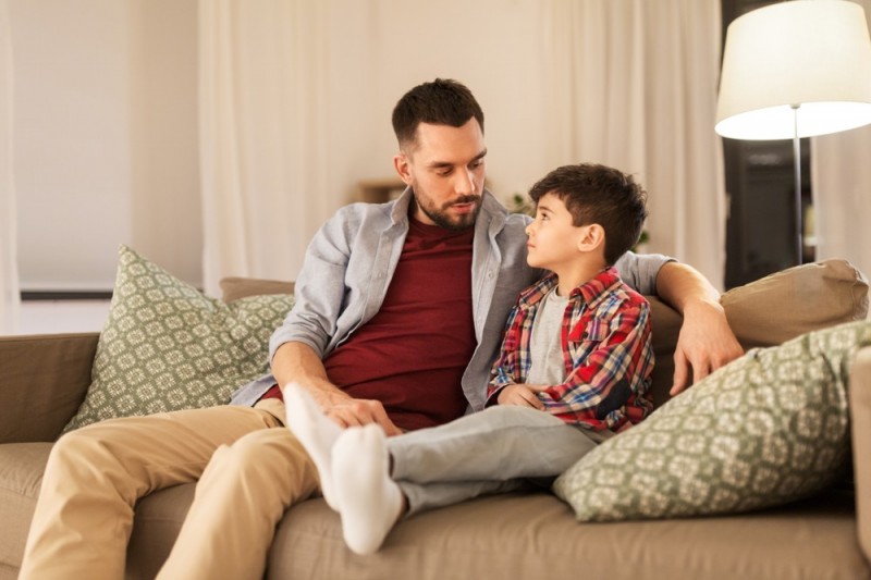stock-photo-family-relationships-and-trust-concept-father-talking-to-his-sad-little-son-at-home-in-evening-1398231200.jpg