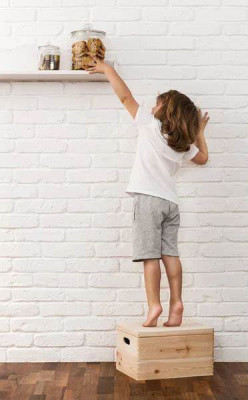 kid reaching for cookies