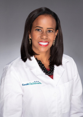 Kanika Bowen-Jallow, MD with coat