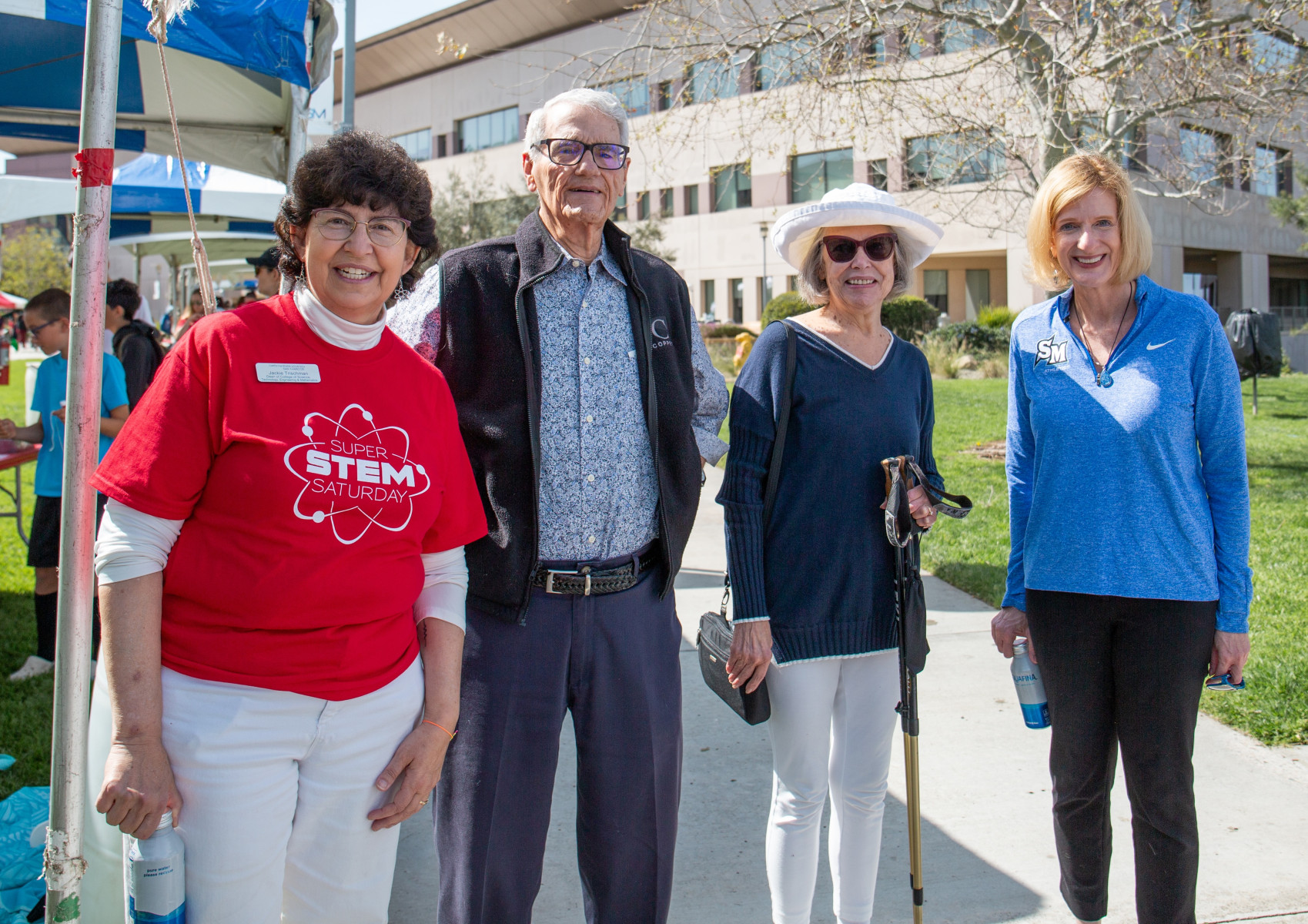 From left to right, CSTEM Dean Jackie Trischman, founding CSUSM faculty Brooks Reid and Marion Reid, and President Ellen Neufeldt at Super STEM Saturday. From left to right, CSTEM Dean Jackie Trischman, founding CSUSM faculty Brooks Reid and Marion Reid, and President Ellen Neufeldt at Super STEM Saturday.