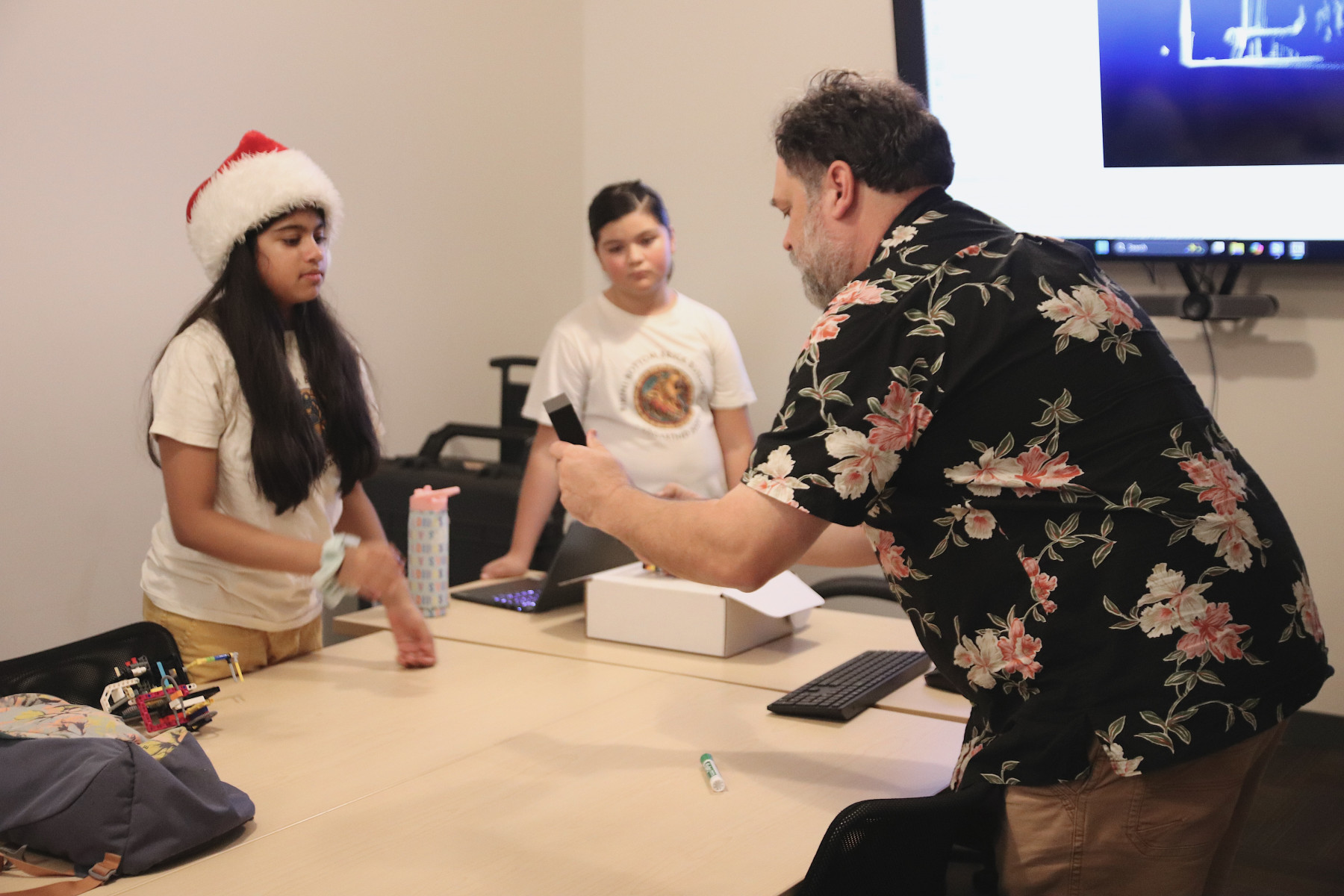 Archaeology professor Jon Spenard met last month with a team of students competing in the FIRST Lego League Challenge. Photo by Tim Meehan Archaeology professor Jon Spenard met last month with a team of students competing in the FIRST Lego League Challenge. Photo by Tim Meehan