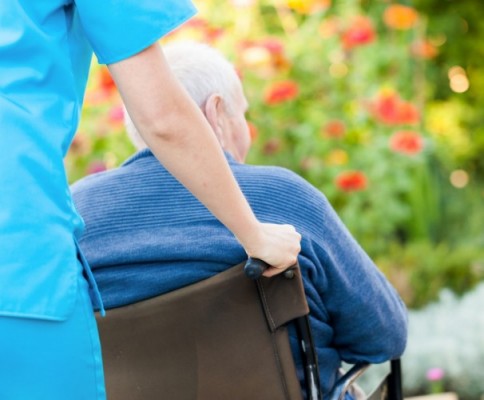 Elderly man and nurse
