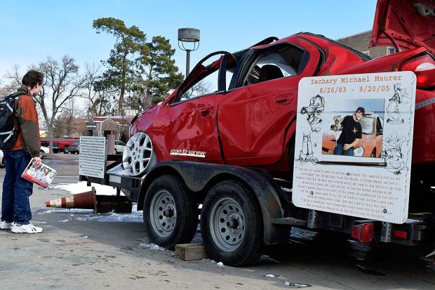 Zachary's car after crash on a trailer