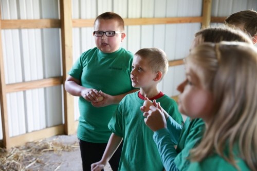 Children holding eggs