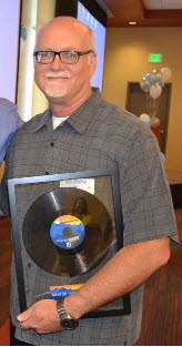 Bob Blume accepts award