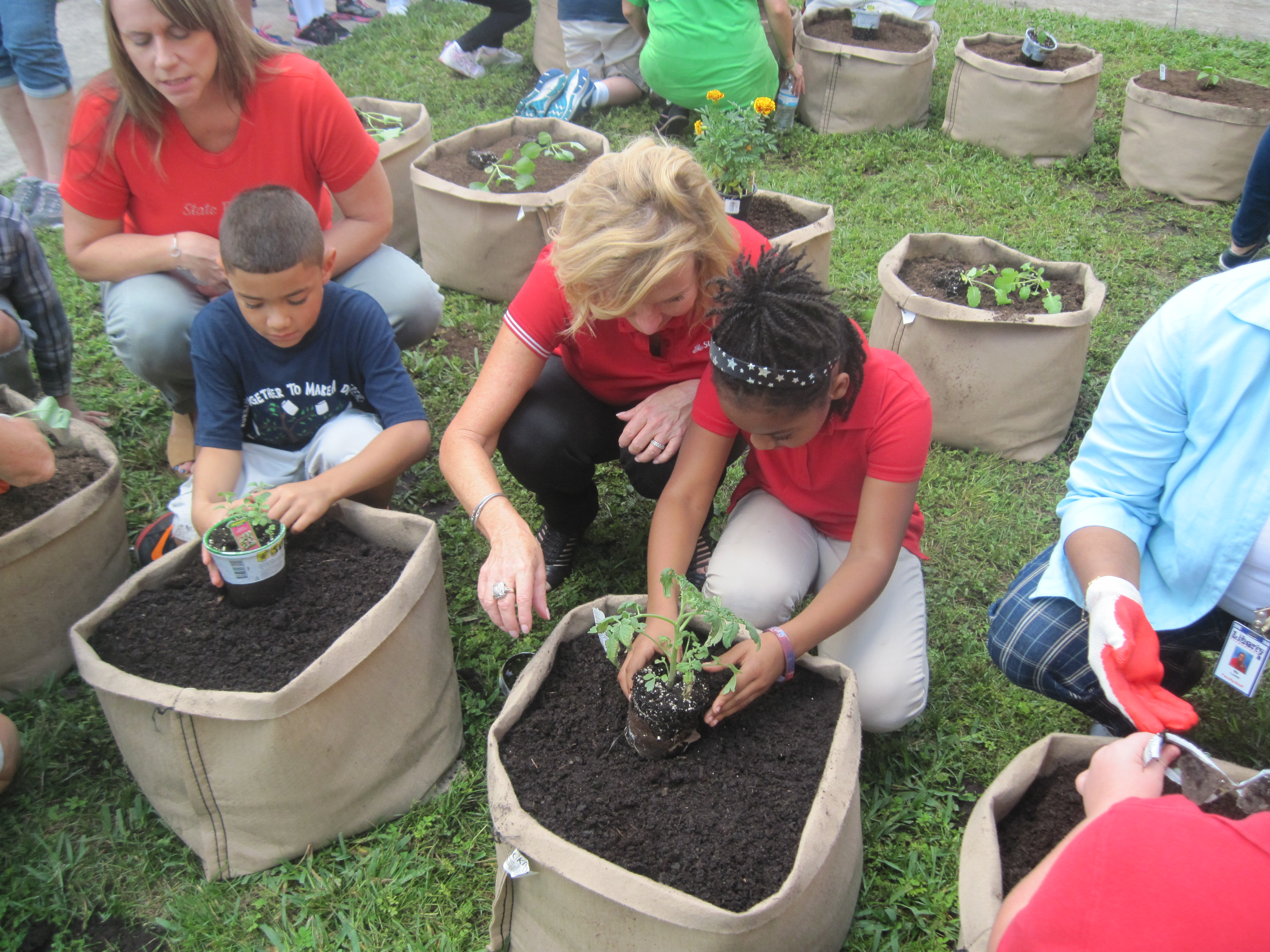 State Farm agents help students plant