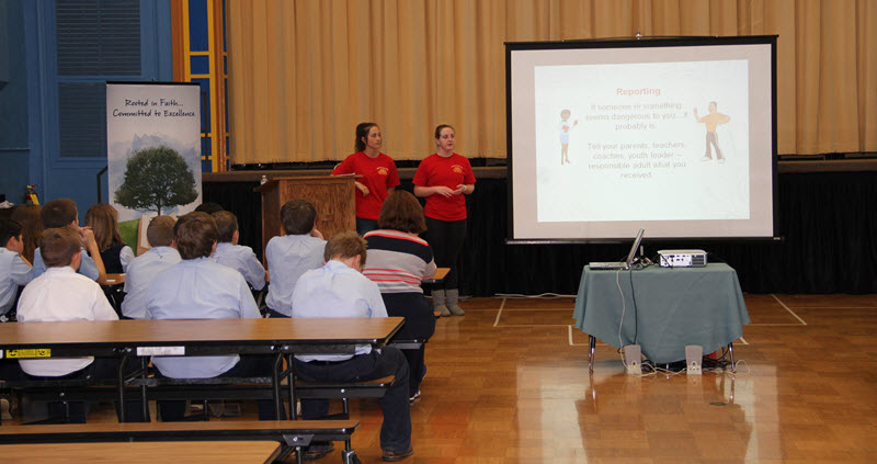 WJU students present to local junior high students.