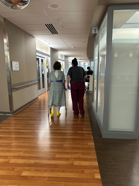 Allison walking in the hospital