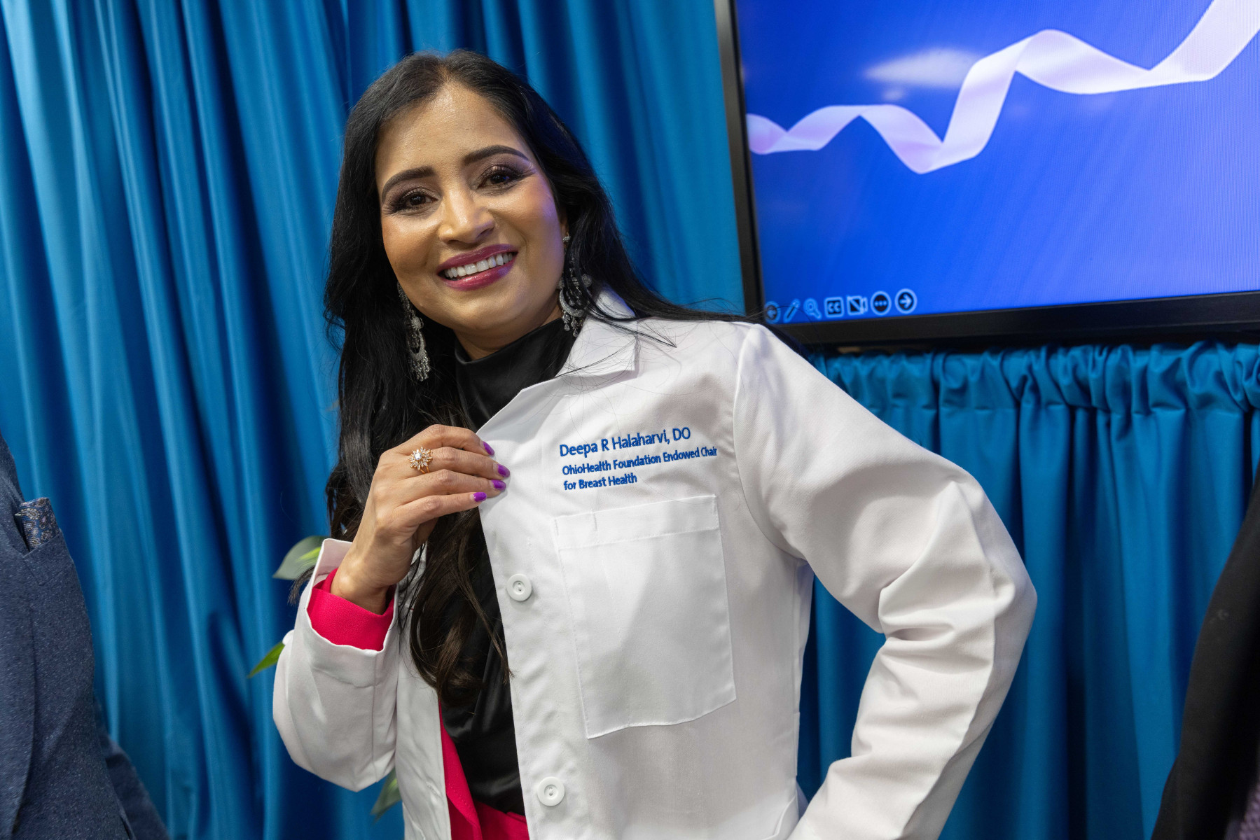 Dr. Halaharvi and White Coat