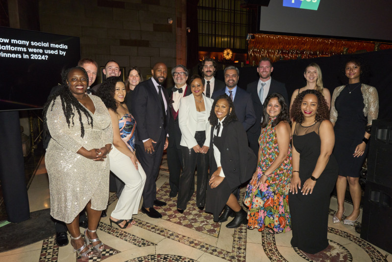 Chief Marketing Officer Sherina Smith, center, and The General's President Tiku Raval, standing right of Sherina, are joined by their marketing teams and advertising agencies.