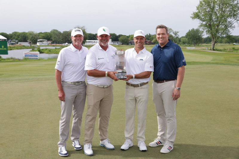 Clarke and Crane with Steve Stricker and American Family Chair and CEO Bill Westrate