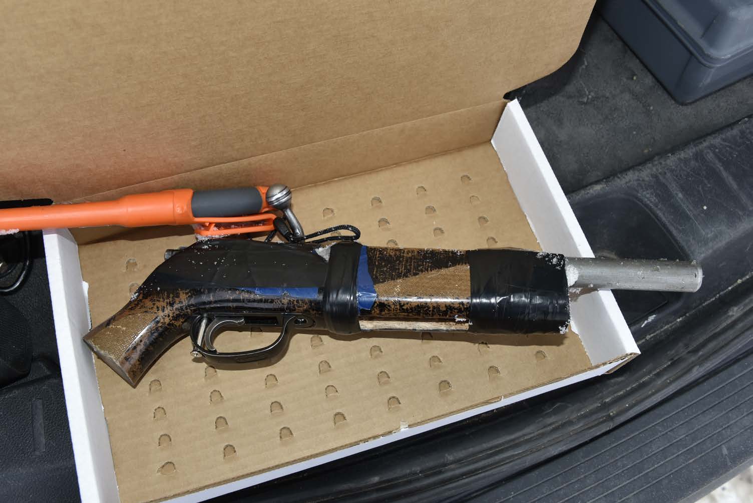 Two charged after police seize firearm and stolen vehicle