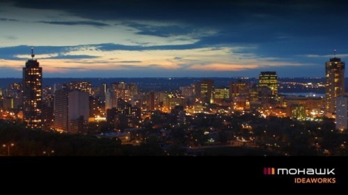 evening skyscape of Hamilton with Ideaworks logo