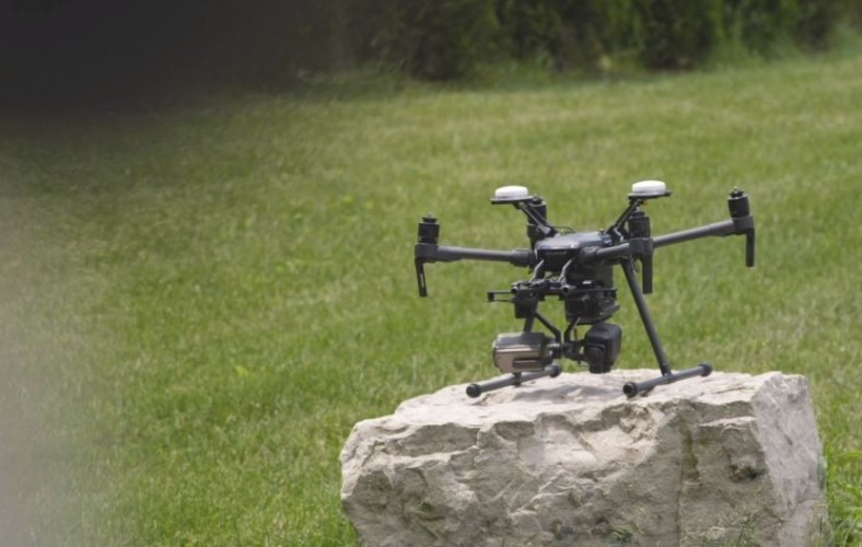 drone sitting on a rock prior to launch