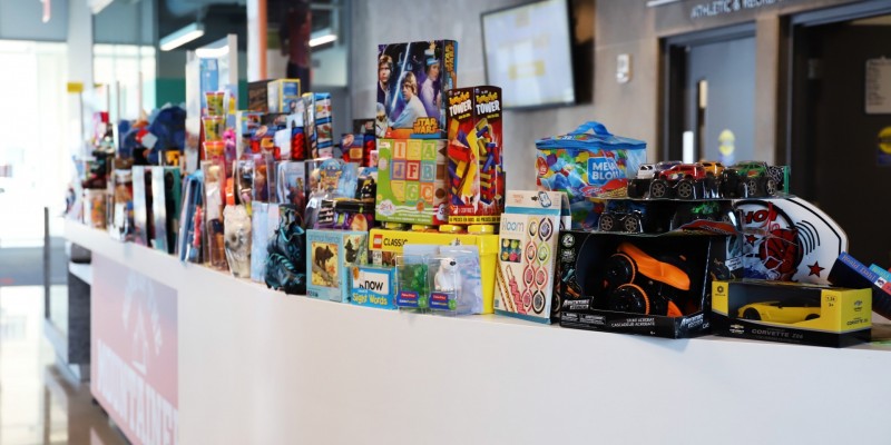 toys loaded up on counter at athletic centre