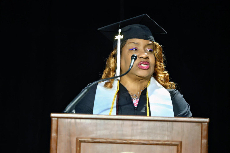 Student speaker Leslye Williams at podium for Commencement 2024
