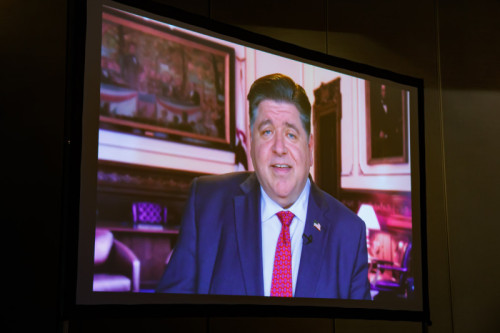 Video screen shot of Illinois Governor JB Pritzker's message to Dr. Cheryl Green