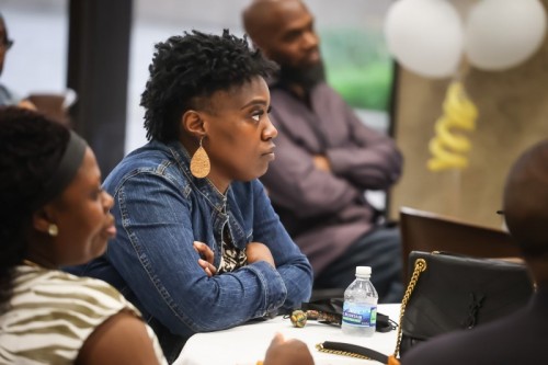 CHHS event attendees listening to speakers