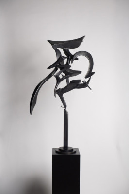 A metal Chinese script sculpture by Gwen Yen Chiu