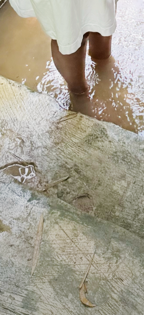 Ghana- feet in water