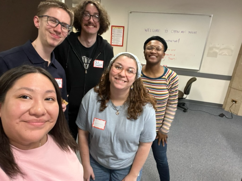 Five people taking a selfie