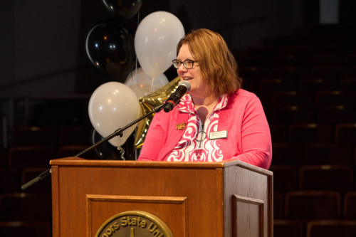 Governors State University Provost giving a speech at a podium